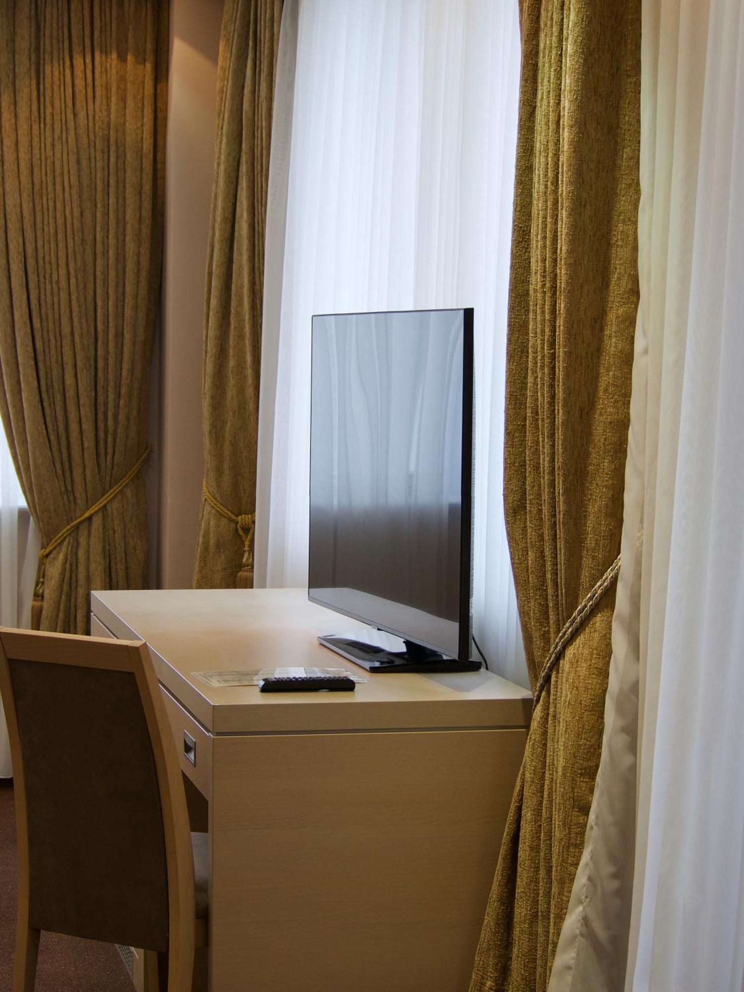 Caspian Riviera Grand Palace Hotel Aktau  Exterior foto A television set