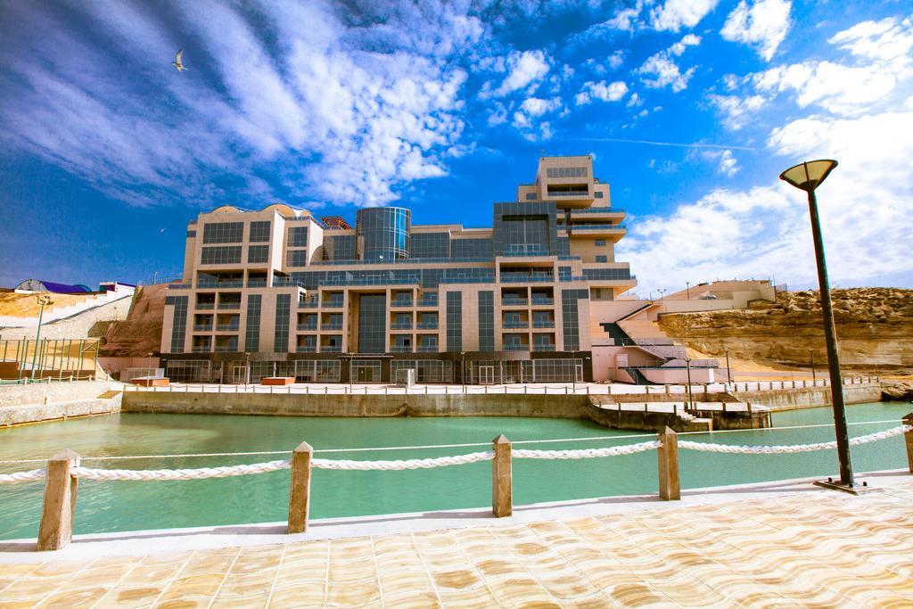 Caspian Riviera Grand Palace Hotel Aktau  Exterior foto The new building of the University of Jordan